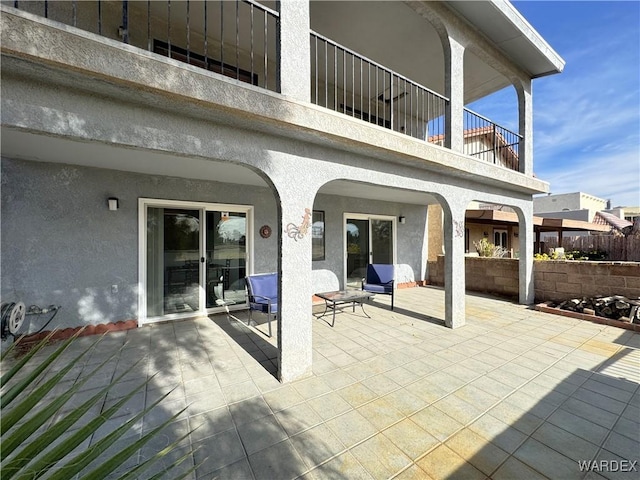 view of patio / terrace featuring a balcony