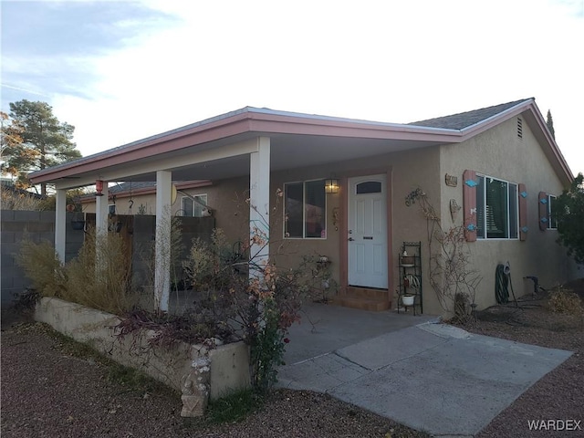 view of front of property featuring stucco siding