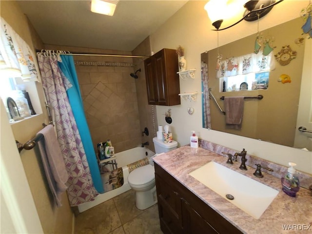 full bath with toilet, tile patterned flooring, shower / bath combo, and vanity