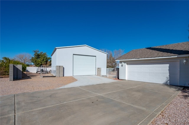 detached garage with fence