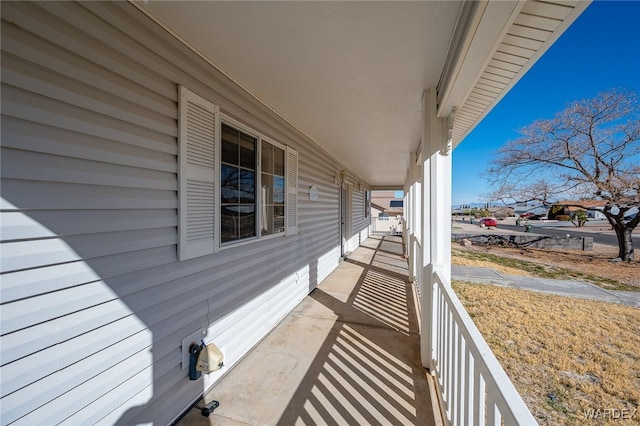 balcony featuring a porch