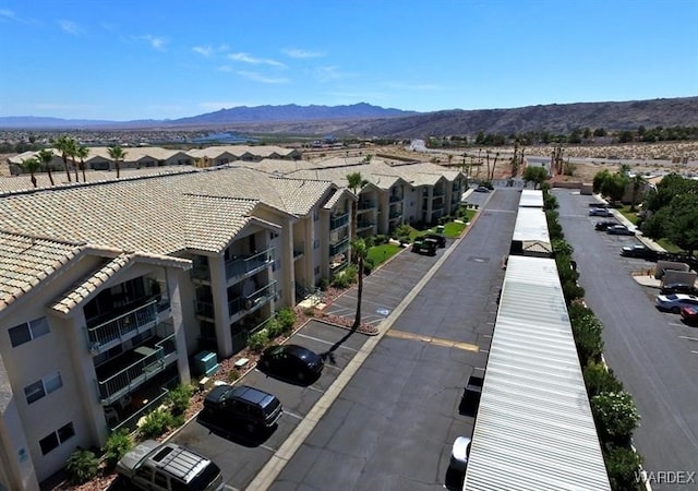 bird's eye view featuring a residential view and a mountain view