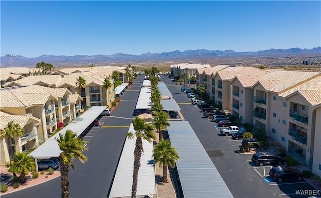 aerial view featuring a residential view and a mountain view