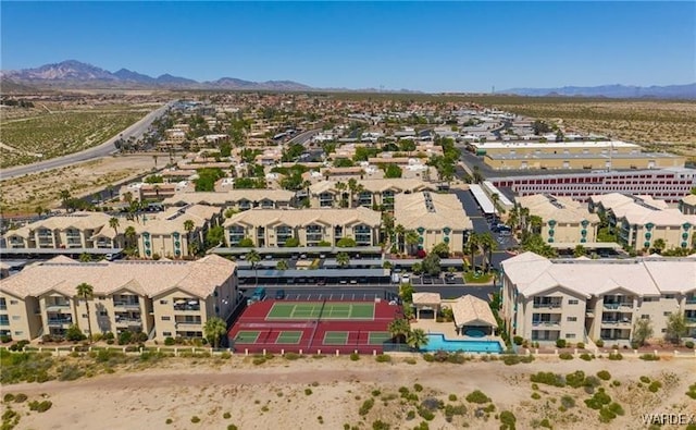 drone / aerial view with a residential view and a mountain view