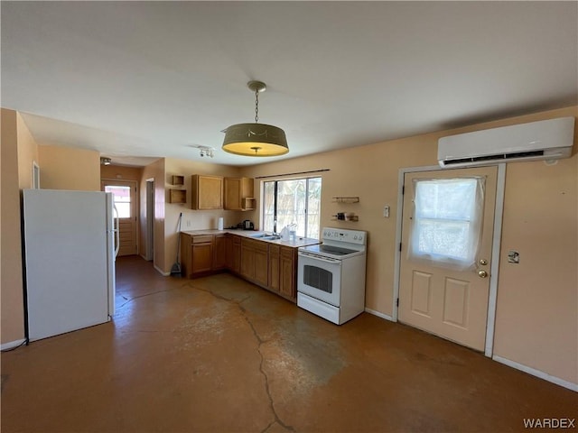 kitchen with white appliances, decorative light fixtures, light countertops, an AC wall unit, and a sink