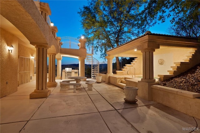 patio terrace at dusk with stairway