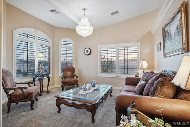 carpeted living area with a chandelier, visible vents, and baseboards