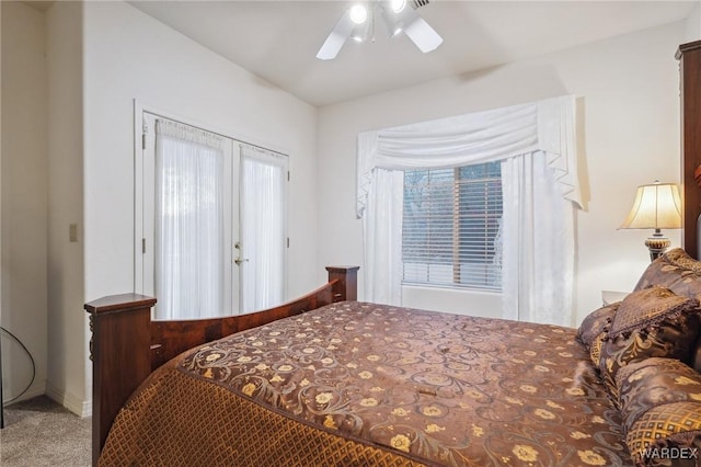 bedroom featuring carpet and a ceiling fan