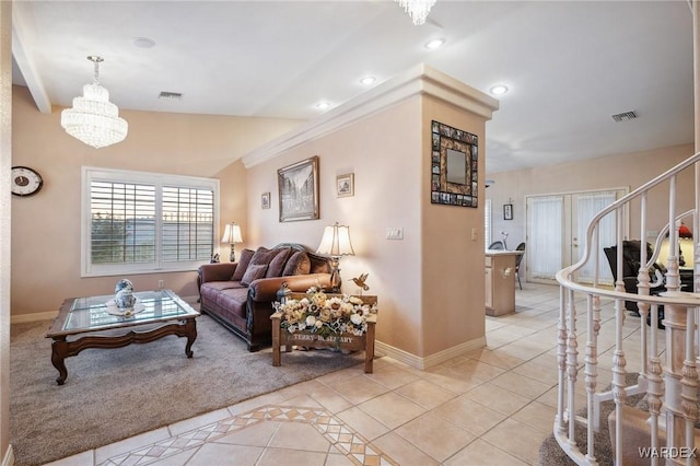 living room with baseboards, visible vents, an inviting chandelier, and light tile patterned floors