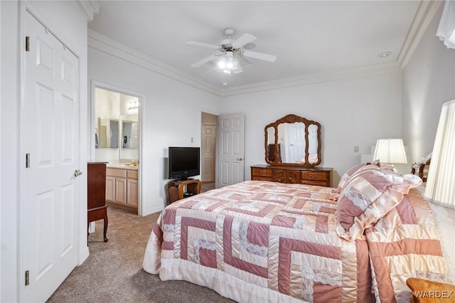 bedroom featuring connected bathroom, ornamental molding, a ceiling fan, and light colored carpet