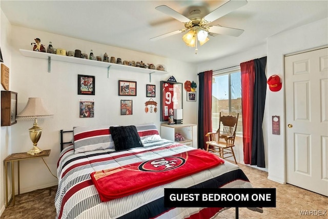 bedroom with a ceiling fan, access to outside, and light colored carpet