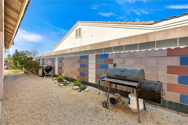 view of side of home featuring stucco siding