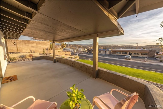 view of patio / terrace featuring fence