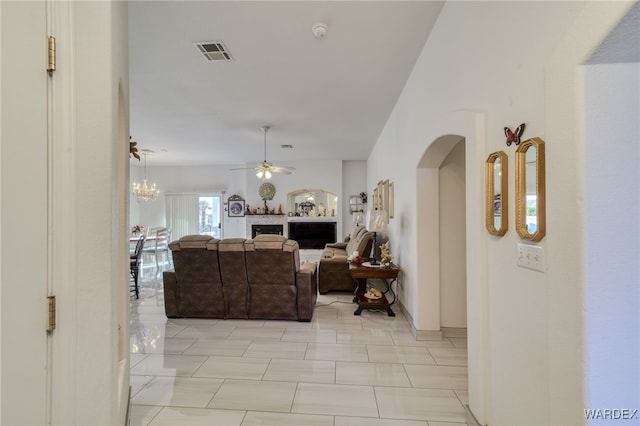 hallway with arched walkways and visible vents