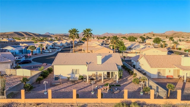 aerial view with a mountain view and a residential view