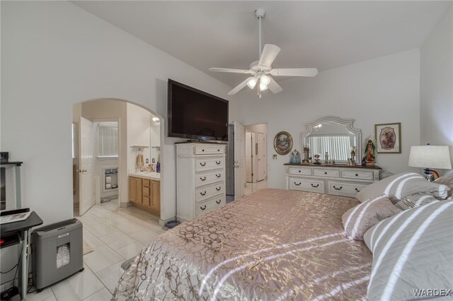 bedroom with arched walkways