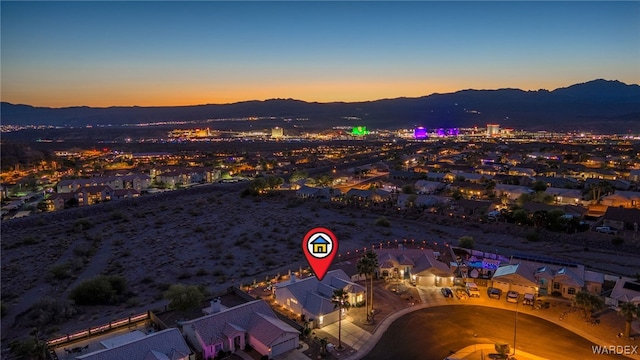 aerial view at dusk with a mountain view