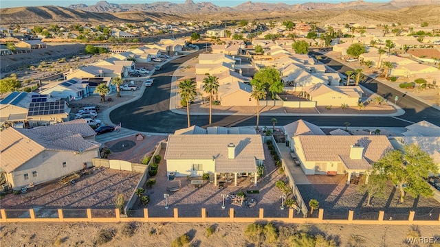 birds eye view of property featuring a mountain view and a residential view