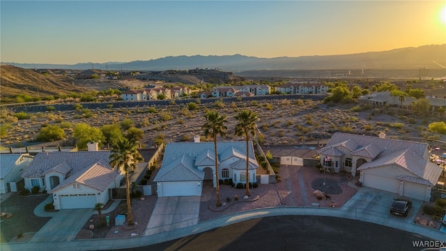 drone / aerial view featuring a mountain view