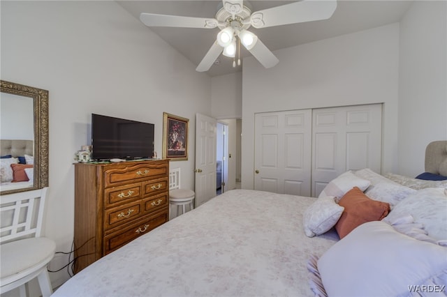 bedroom featuring a closet, ceiling fan, and vaulted ceiling