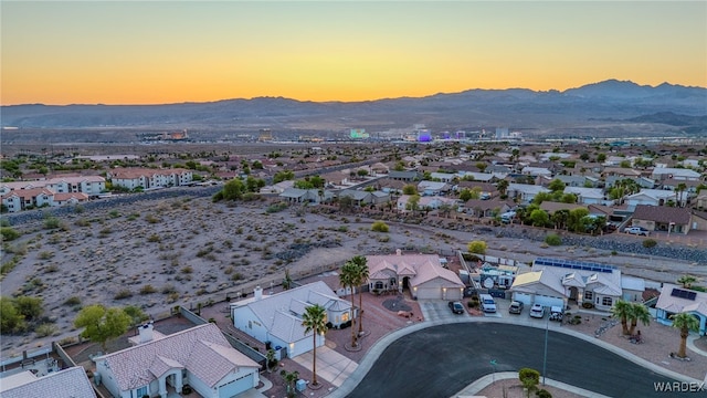drone / aerial view featuring a mountain view and a residential view