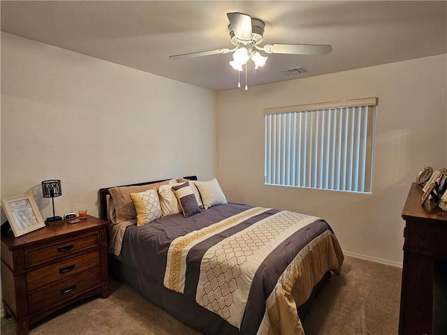 2084 E Crystal Dr, Fort Mohave, AZ 86426 - carpeted bedroom with ceiling fan and baseboards