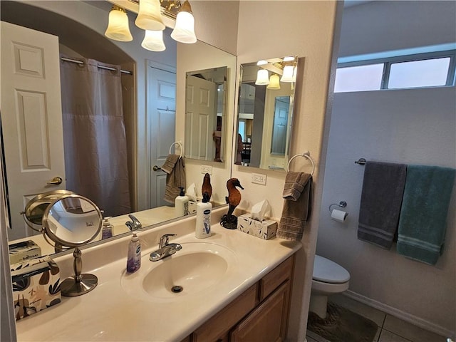 2084 E Crystal Dr, Fort Mohave, AZ 86426 - bathroom with a chandelier, tile patterned floors, toilet, vanity, and curtained shower