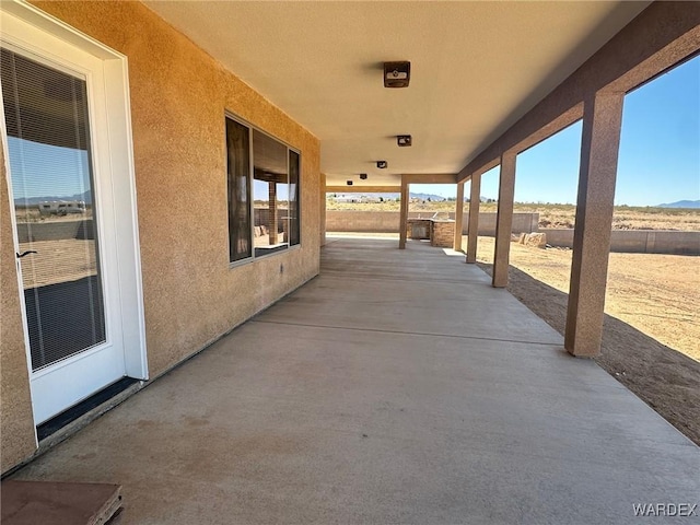 view of patio / terrace with fence