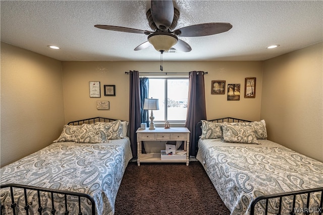 bedroom featuring a ceiling fan, recessed lighting, dark carpet, and a textured ceiling