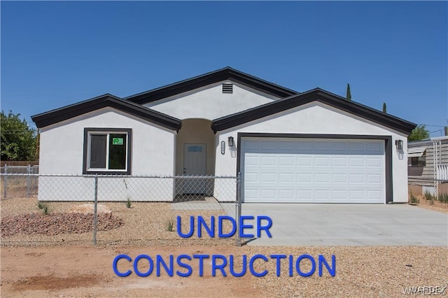 ranch-style home with a garage, concrete driveway, stucco siding, and fence