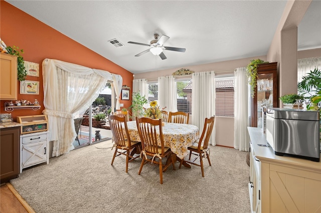 3854 Heather Ave, Kingman, AZ 86401 - dining space featuring ceiling fan, lofted ceiling, and light carpet