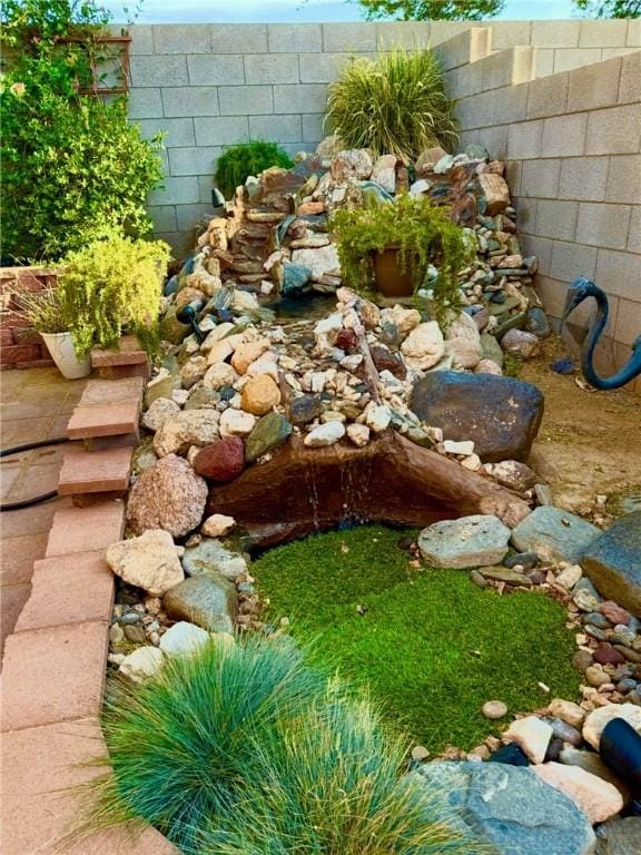 3854 Heather Ave, Kingman, AZ 86401 - view of yard featuring a garden pond