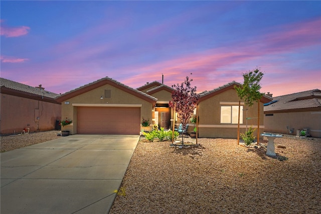 3854 Heather Ave, Kingman, AZ 86401 - ranch-style home featuring stucco siding, a garage, and driveway
