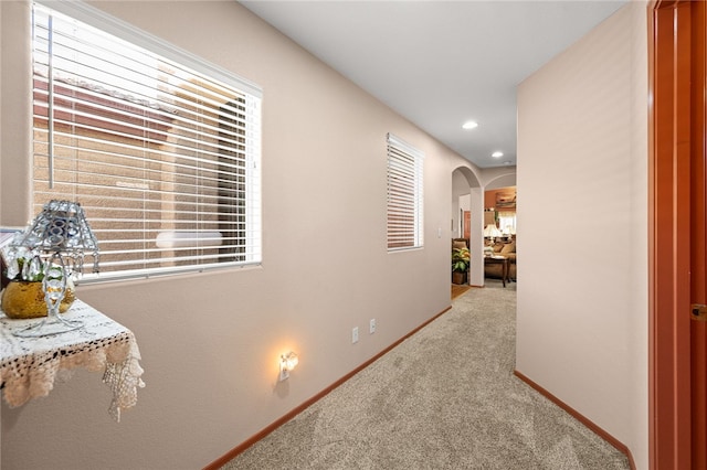 3854 Heather Ave, Kingman, AZ 86401 - hall with arched walkways, carpet flooring, baseboards, and recessed lighting