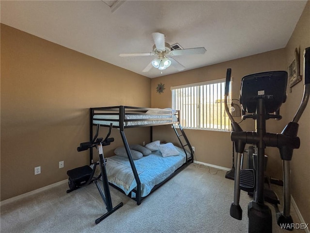 carpeted bedroom with ceiling fan, visible vents, and baseboards