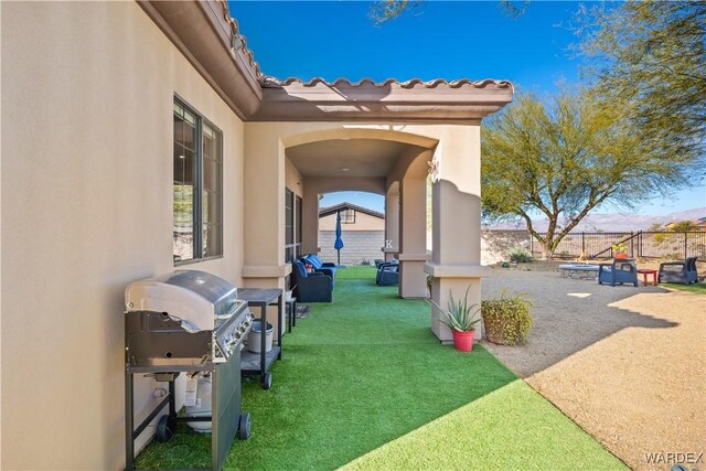 view of home's community featuring a patio area and a yard