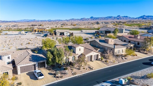 birds eye view of property featuring a residential view and a mountain view