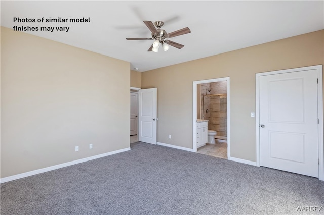 unfurnished bedroom featuring light carpet, ceiling fan, baseboards, and ensuite bathroom