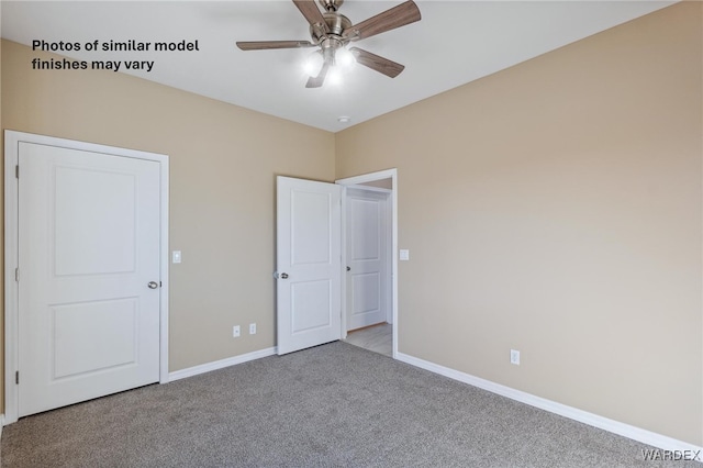 unfurnished bedroom with light carpet, ceiling fan, and baseboards