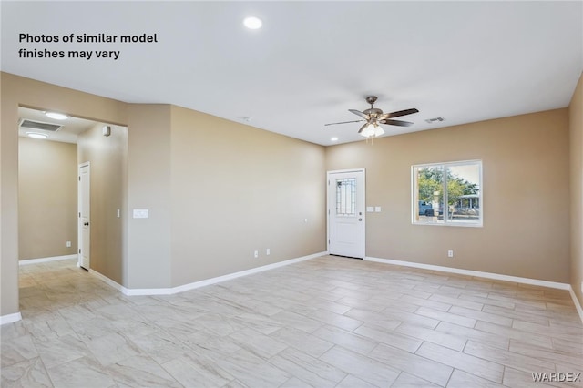 spare room with ceiling fan, visible vents, baseboards, and recessed lighting