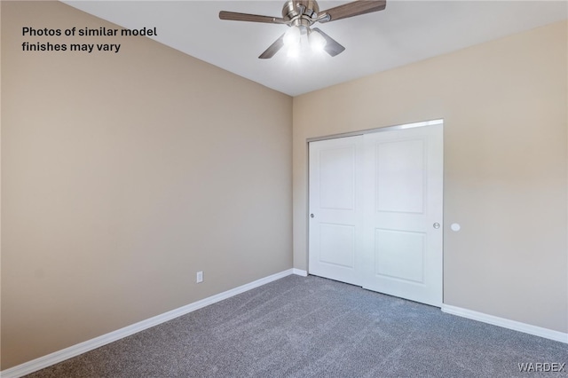 unfurnished bedroom featuring a ceiling fan, dark colored carpet, a closet, and baseboards