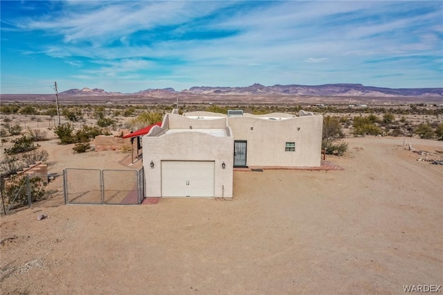 drone / aerial view featuring a mountain view