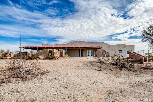 view of front of house with stucco siding