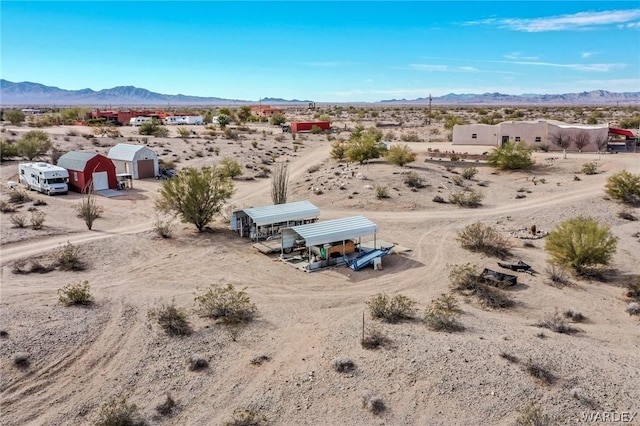 aerial view with a desert view and a mountain view