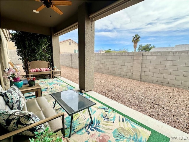 view of patio with ceiling fan and a fenced backyard