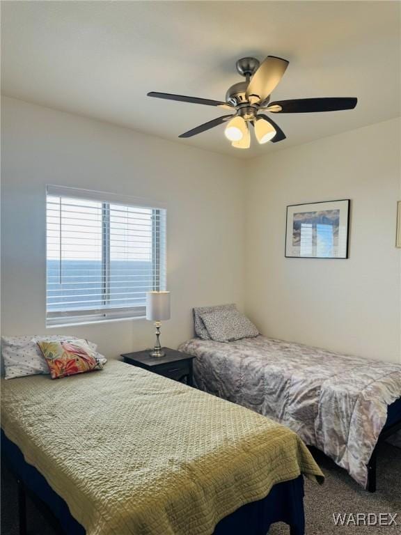 bedroom with carpet floors and ceiling fan