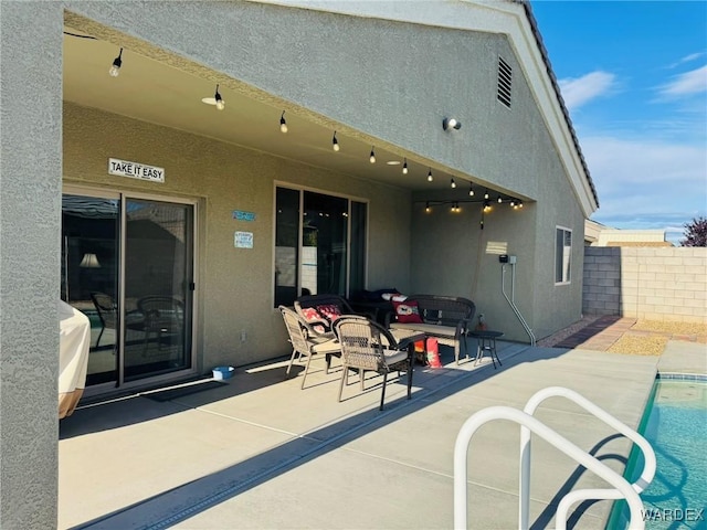exterior space featuring a fenced in pool and fence