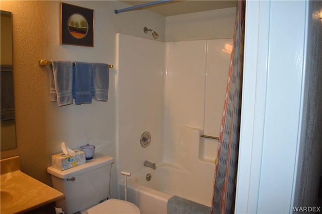 full bathroom with toilet, bathing tub / shower combination, and vanity