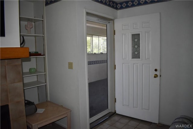 interior space with dark tile patterned floors