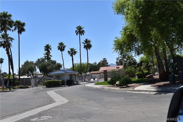 1800 Clubhouse Dr Unit 100, Bullhead City, AZ 86442 - view of road featuring a gate, curbs, and sidewalks